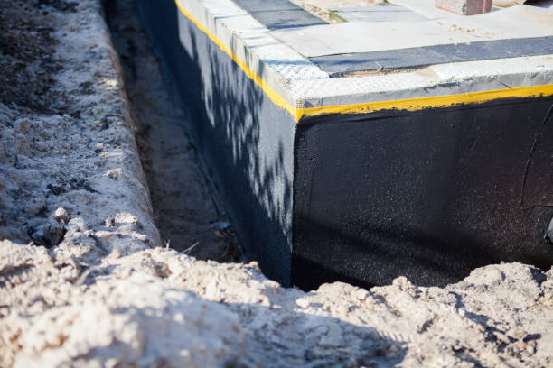 Professional Waterproofing technician working in Elmer, NJ